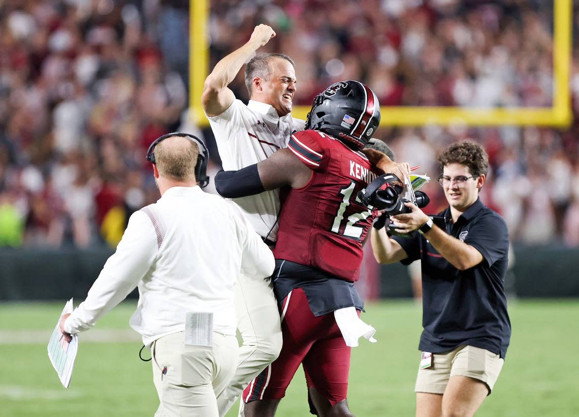 Shane Beamer celebrates Traevon Kenion’s blocked punt in the second half of the win over Georgia State.