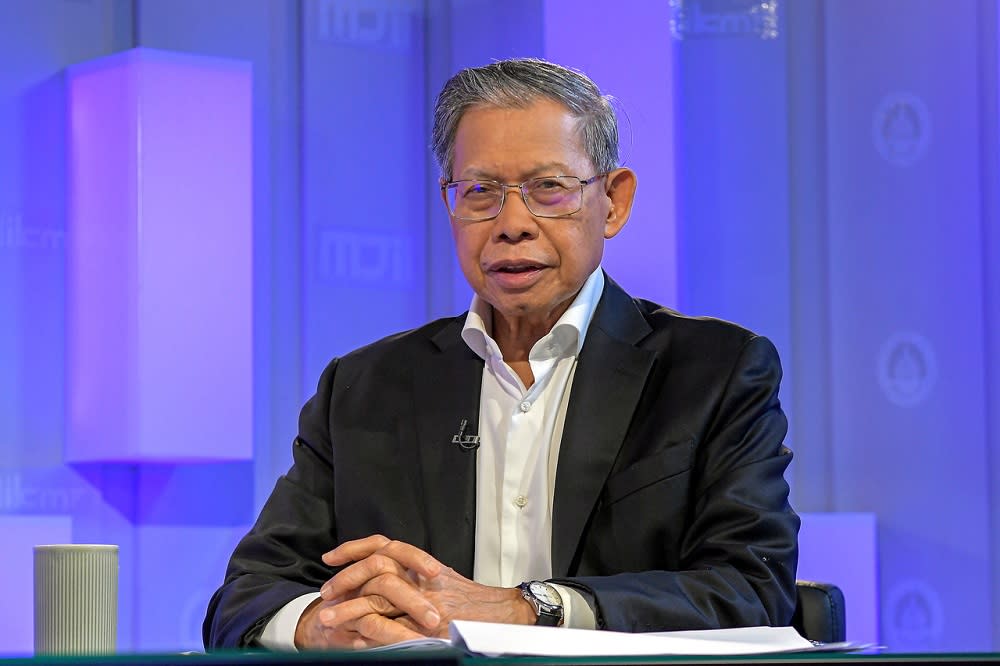 Datuk Seri Mustapa Mohamed said the Covid-19 pandemic has forced the government to re-evaluate the HSR project. — Bernama pic