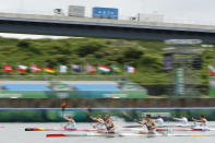 <p>TOKYO, JAPAN - AUGUST 02: Competitors race during the Women's Kayak Double 500m Quarterfinal on day ten of the Tokyo 2020 Olympic Games at Sea Forest Waterway on August 02, 2021 in Tokyo, Japan. (Photo by Adam Pretty/Getty Images)</p> 