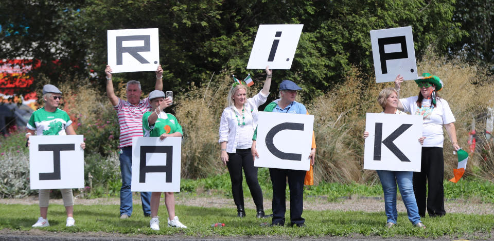 Republic of Ireland fans gather to sing the Ireland world cup anthem "Put em under pressure" at 12:30 Walkinstown Roundabout in Dublin as Jack Charltons funeral comes to a close in Newcastle