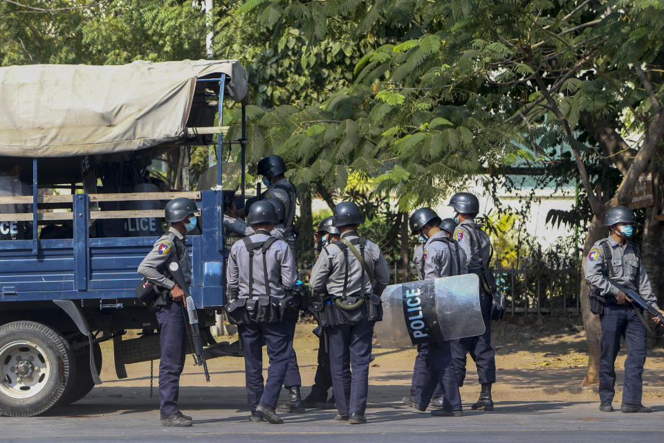 Police in riot gear are deployed ahead of demonstrations against the military coup in Mandalay, Myanmar, Wednesday, Feb. 17, 2021. The U.N. expert on human rights in Myanmar warned of the prospect for major violence as demonstrators gather again Wednesday to protest the military's seizure of power. (AP Photo)