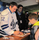 Alex Ovechkin signs photo for a fan. (#NickInEurope)