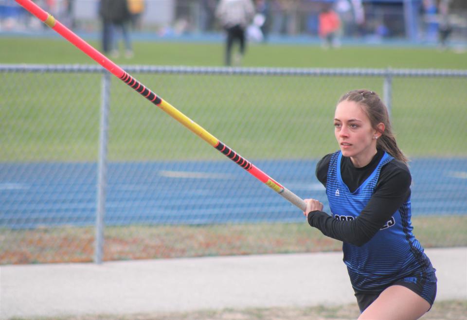 Inland Lakes senior Luci Bunker competes in the pole vault event during Tuesday's Bulldog Invitational.