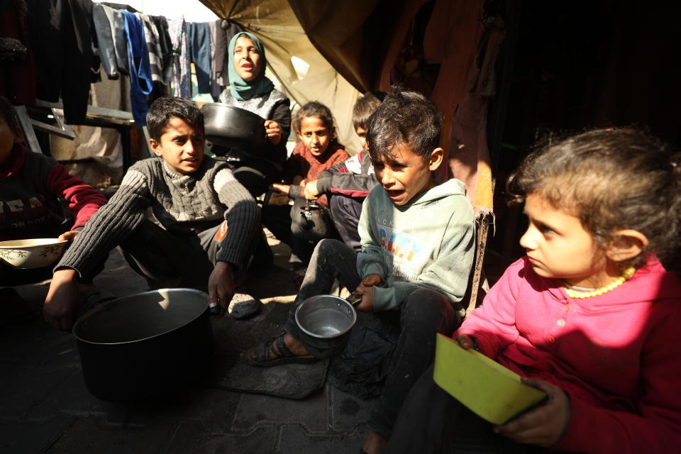 Palestinian children wait for the food at Jabalia Refugee Camp in Gaza, Feb. 26, 2024. / Credit: Dawoud Abo Alkas/Anadolu/Getty