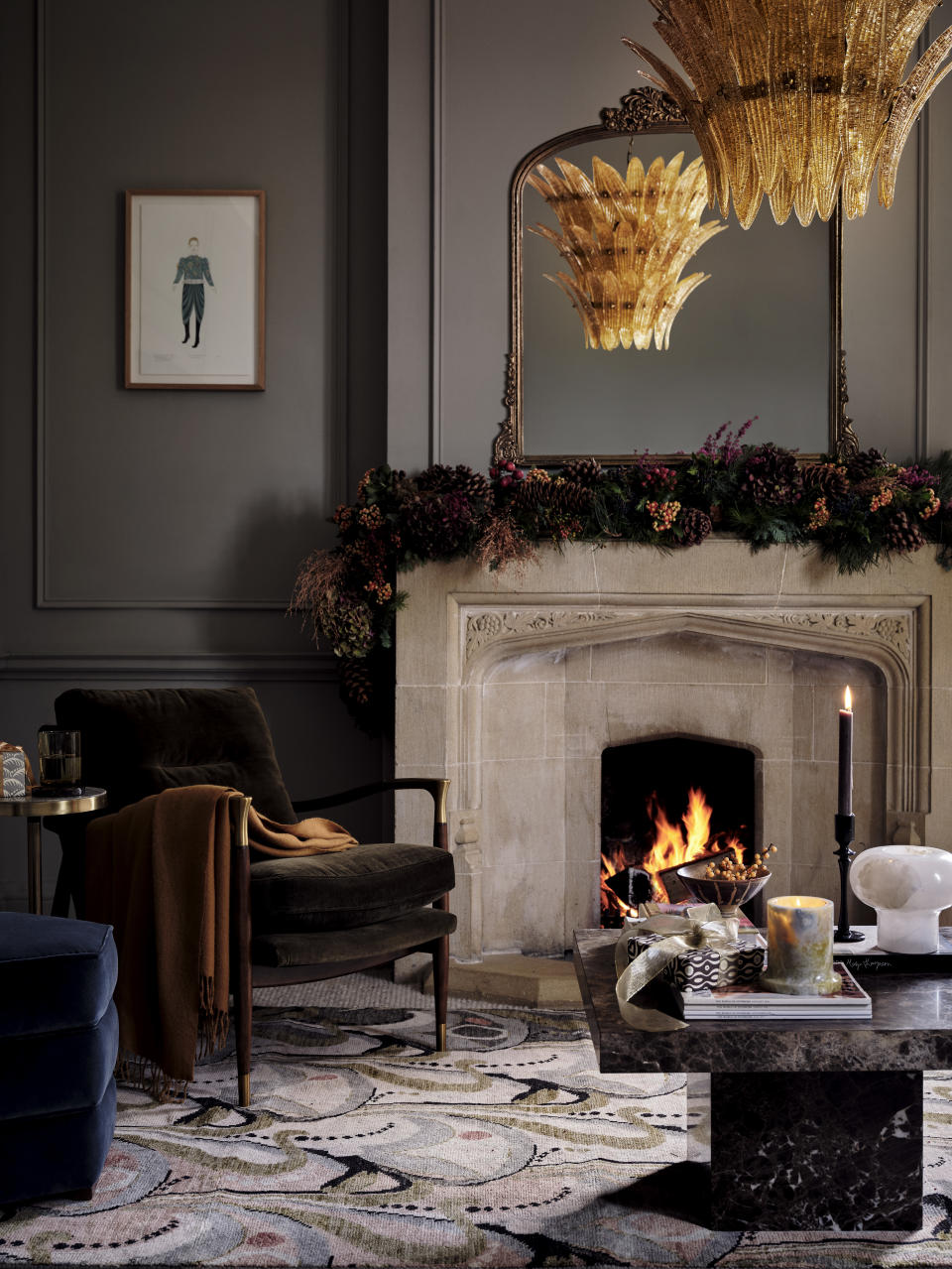 A living room with Christmas decor and layered fabrics