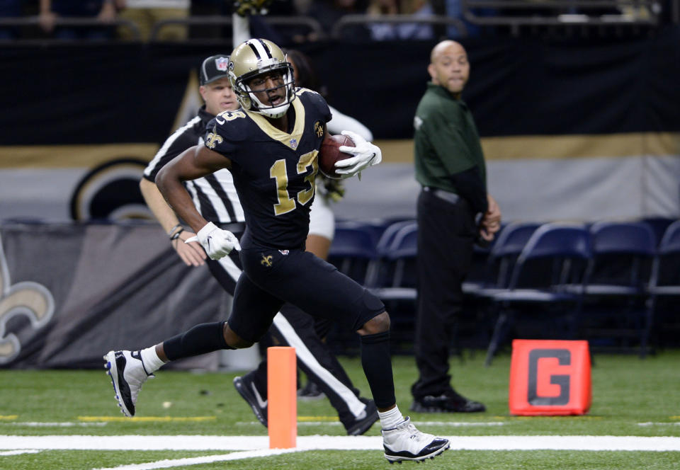 New Orleans Saints wide receiver Michael Thomas (13) scores on a 72 yard touchdown reception in the second half of an NFL football game against the Los Angeles Rams in New Orleans, Sunday, Nov. 4, 2018. (AP Photo/Bill Feig)