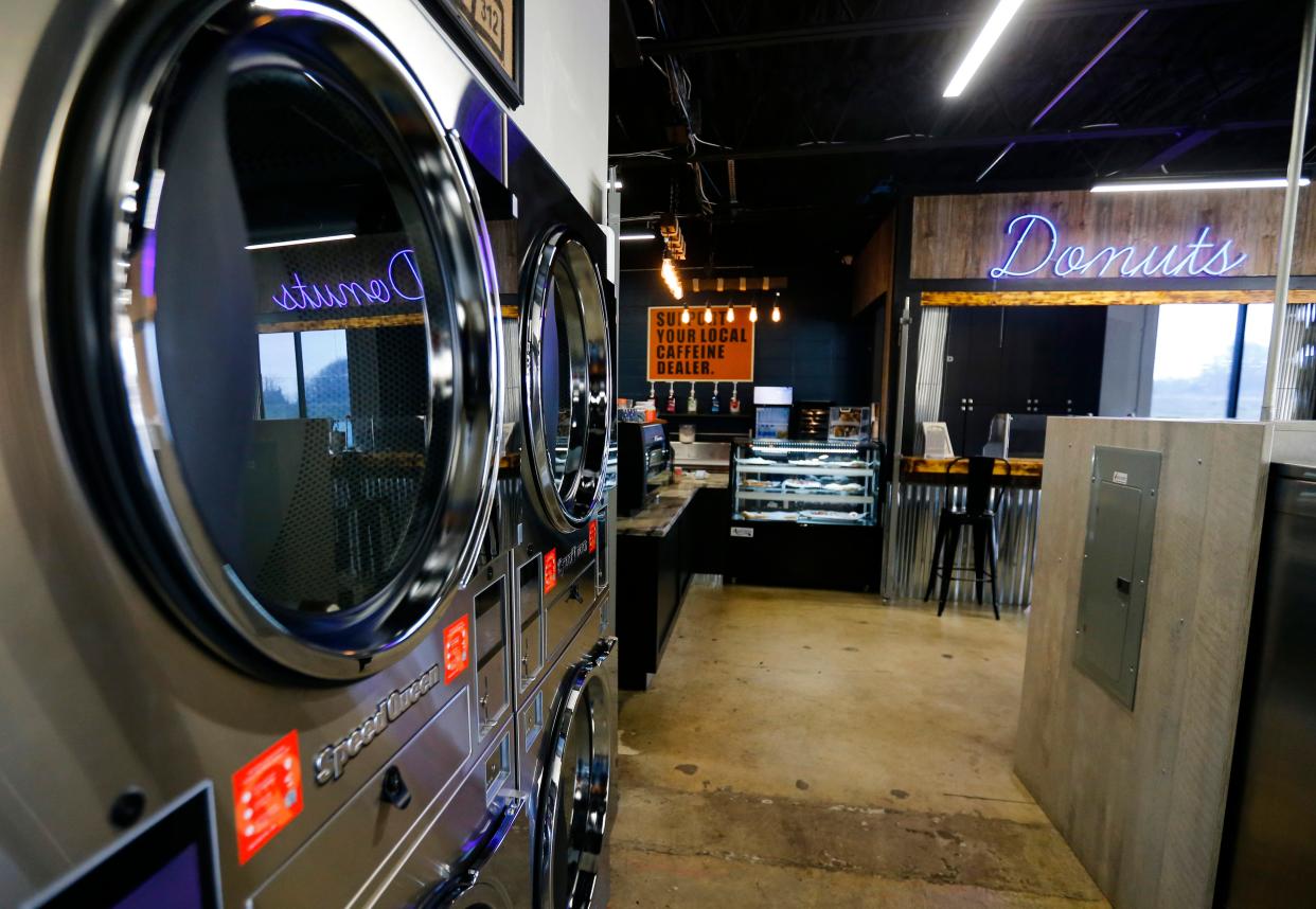 Laundry machines at the Washboard Cafe on Wednesday, March 29, 2023.