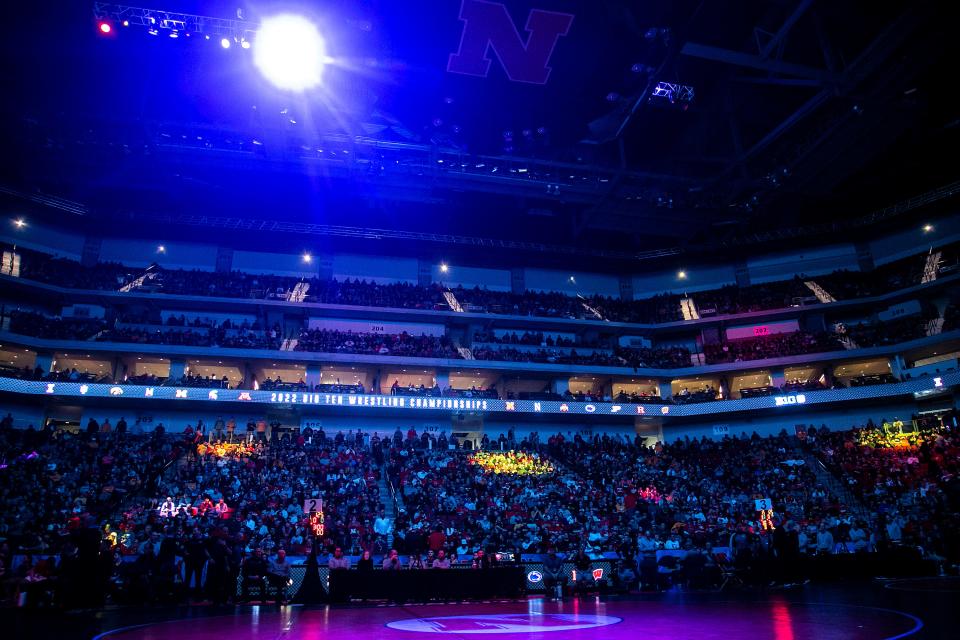 Lights illuminate the mats before the finals at 125 pounds during the third session of the Big Ten Wrestling Championships, Sunday, March 6, 2022, at Pinnacle Bank Arena in Lincoln, Nebraska.