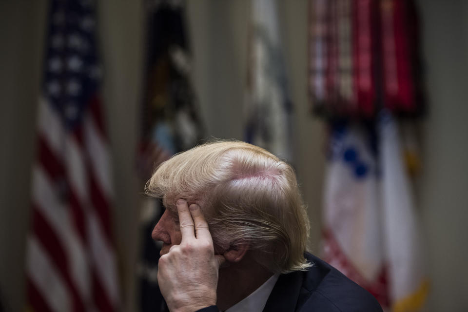 Trump listens during a meeting with women small-business owners in the Roosevelt Room of the White House on March 27, 2017.