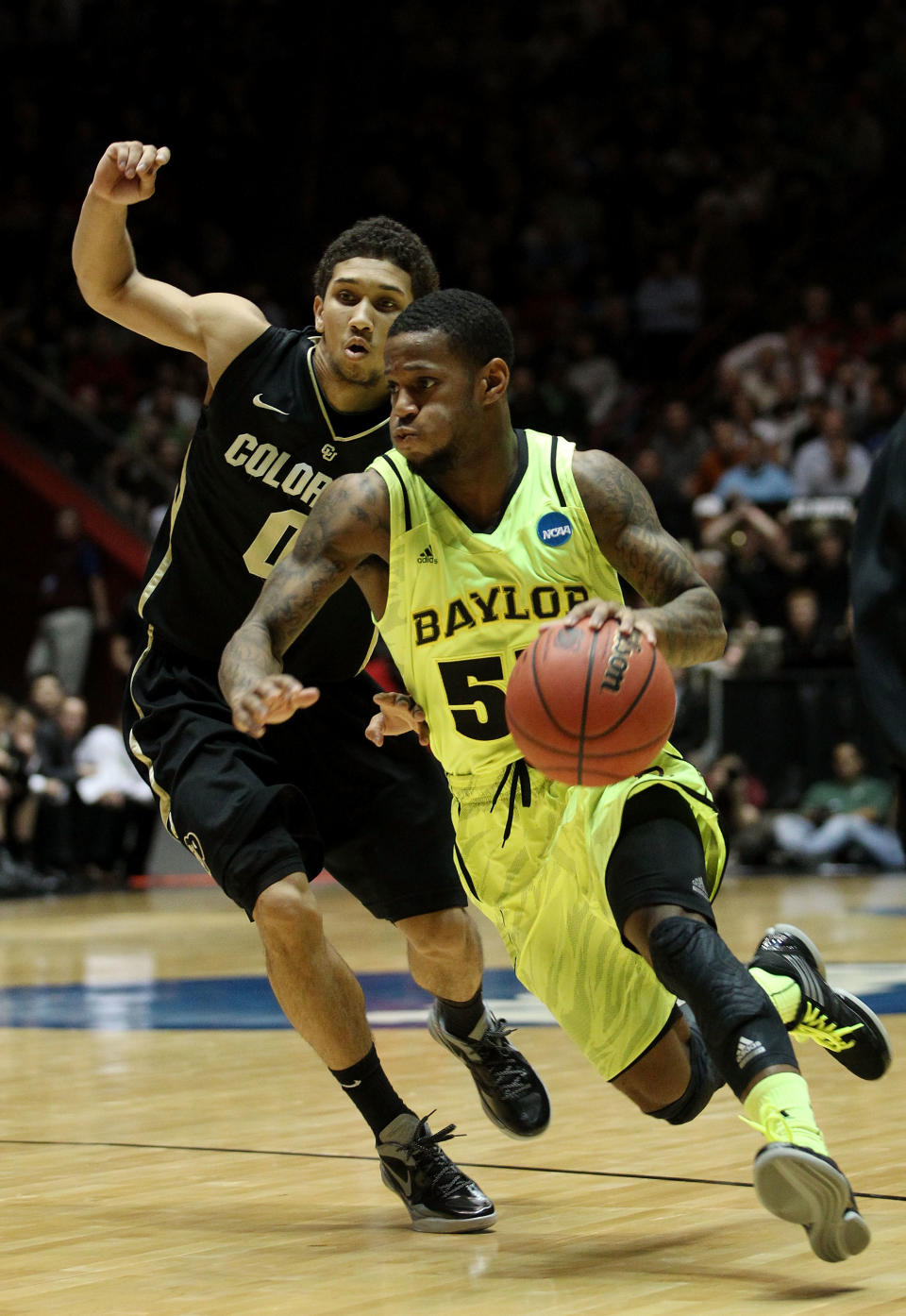 ALBUQUERQUE, NM - MARCH 17: Pierre Jackson #55 of the Baylor Bears drives against Askia Booker #0 of the Colorado Buffaloes in the second half of the game during the third round of the 2012 NCAA Men's Basketball Tournament at The Pit on March 17, 2012 in Albuquerque, New Mexico. (Photo by Christian Petersen/Getty Images)