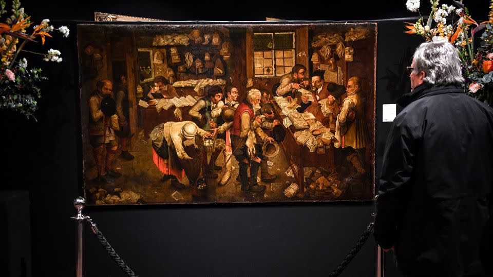 “The Payment of the Tithes,” by Pieter Brueghel the Younger, cleaned up well. - Christophe Archambault/AFP/Getty Images
