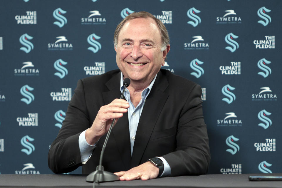 FILE - NHL Commissioner Gary Bettman speaks during a news conference before an NHL hockey game between the Anaheim Ducks and the Seattle Kraken at Climate Pledge Arena, Thursday, March 30, 2023, in Seattle. Bettman was honored by the Sports Business Journal on Wednesday, May 24, 2023, with a lifetime achievement award for the NHL's growth during his 30 years as commissioner, from a business that generated $437 million in revenue before he took over to nearly $6 billion now. (AP Photo/Jason Redmond, File0