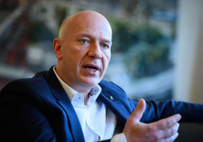 Berlin Mayor Kai Wegner, a member of the centre-right Christian Democrats (CDU), sits in his office in the Red City Hall during an interview with the German Press Agency (dpa). Bernd von Jutrczenka/dpa