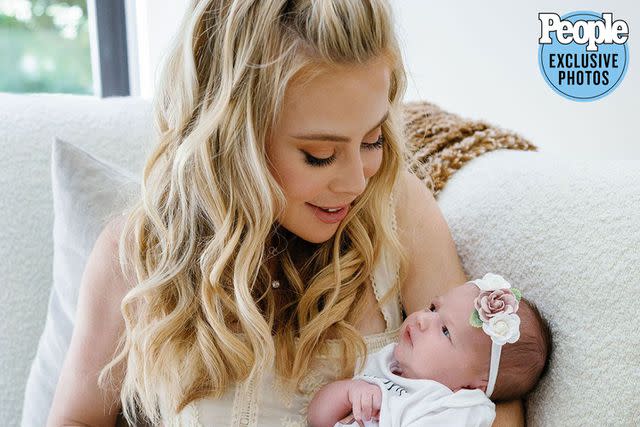 <p>Jenny Quicksall Photography</p> Tara Lipinski and baby Georgie