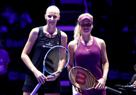 Tennis - WTA Tour Finals - Singapore Indoor Stadium, Kallang, Singapore - October 23, 2018 Ukraine's Elina Svitolina and Czech Republic's Karolina Pliskova pose before their group stage match REUTERS/Edgar Su