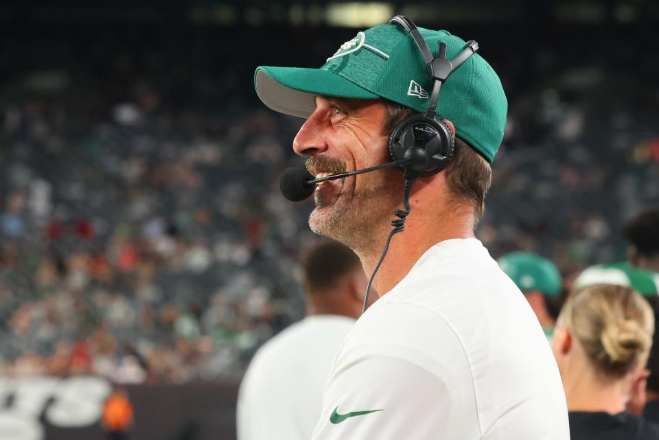 Aug 19, 2023; East Rutherford, New Jersey, USA; New York Jets quarterback Aaron Rodgers (8) on the sideline against the Tampa Bay Buccaneers during the second half at MetLife Stadium.