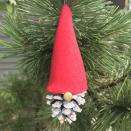 <p>The fun thing about this craft is that you get to start it by going on a nature walk. Then, with just a few tweaks, your natural raw materials become a cheerful holiday gnome.</p><p><a href="https://www.bowdabra.com/blog/2021/07/09/how-to-make-the-perfect-holiday-gnomes-from-pine-cones/" rel="nofollow noopener" target="_blank" data-ylk="slk:Get the tutorial at Bowdabra »" class="link rapid-noclick-resp"><em>Get the tutorial at Bowdabra »</em></a></p>