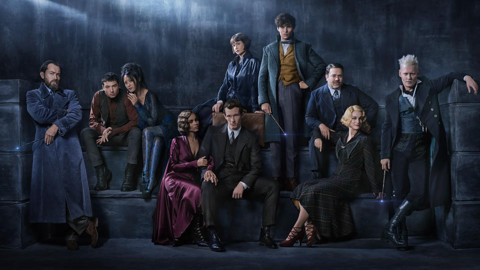 <p>The full ensemble (from left): Jude Law joins the cast as the young Albus Dumbledore; Ezra Miller returns as Credence; Claudia Kim plays Maledictus, carrier of a blood curse that destines her ultimately to transform into a beast; Zoë Kravitz plays Leta Lestrange, Newt’s former paramour, now engaged to his brother; Callum Turner plays Newt’s older brother, Theseus Scamander, a celebrated war hero and the head of the Auror Office at the British Ministry of Magic; Katherine Waterston returns as Tina Goldstein; Eddie Redmayne stars as magizoologist Newt Scamander, who has published his research in <em>Fantastic Beasts and Where to Find Them</em>; Dan Fogler reprises the role of the only No-Maj in the group, Jacob Kowalski; Alison Sudol is back as Tina’s free-spirited sister, Queenie Goldstein, a Legilimens who can read minds; and Johnny Depp returns as the powerful dark wizard Gellert Grindelwald.<br> (Photo: Warner Bros.) </p>