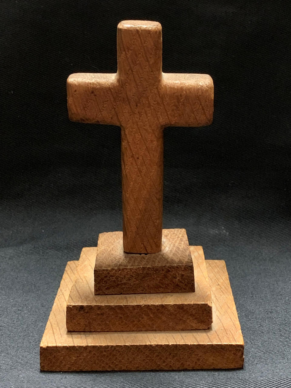 The wooden cross made from oak taken from the Titanic. (PA)