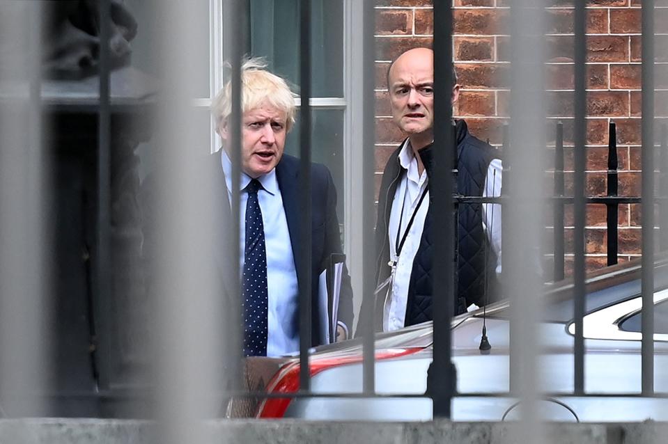 <p>The prime minister and Dominic Cummings when he was Mr Johnson’s chief adviser</p> (AFP via Getty)