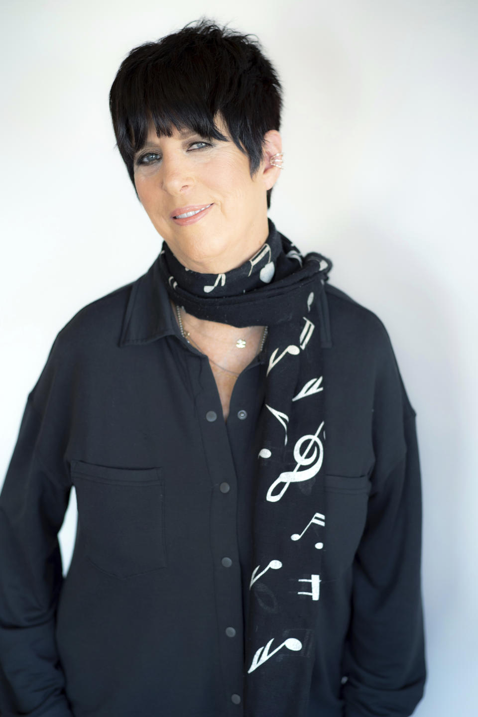 Songwriter Diane Warren poses in her studio at the Realsongs Diane Warren Music Company in Los Angeles, Tuesday, Nov. 15, 2022. Warren will receive an honorary Oscar at the annual Governors Awards. She’s the first songwriter to ever get the award. (AP Photo/Damian Dovarganes)