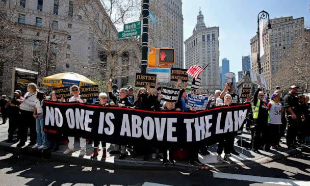 PHOTO: Opponents of former President Donald Trump protest outside the Manhattan District Attorney's office in New York, April 4, 2023. (Leonardo Munoz/AFP via Getty Images)