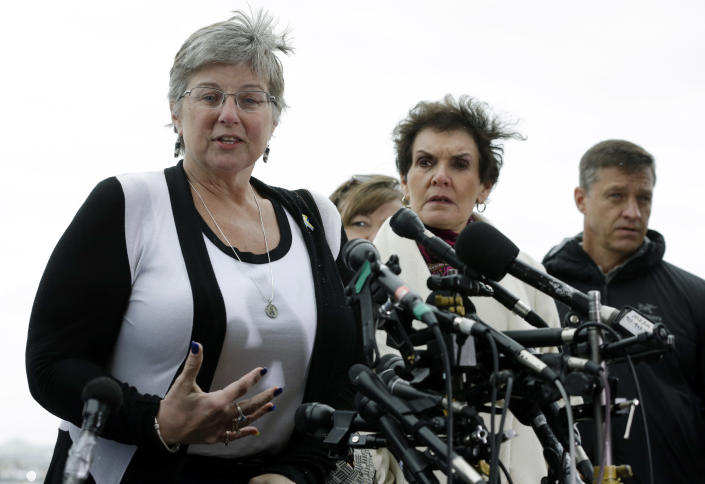 Boston Marathon bombing survivor Karen Brassard, left, speaks alongside Laurie Scher, middle, and Mike Ward, Wednesday, April 8, 2015, outside federal court in Boston. Dzhokhar Tsarnaev was convicted on all charges Wednesday in the Boston Marathon bombing by a jury that will now decide whether the 21-year-old should be executed or shown mercy for what his lawyer says was a crime masterminded by his big brother. (AP Photo/Steven Senne)