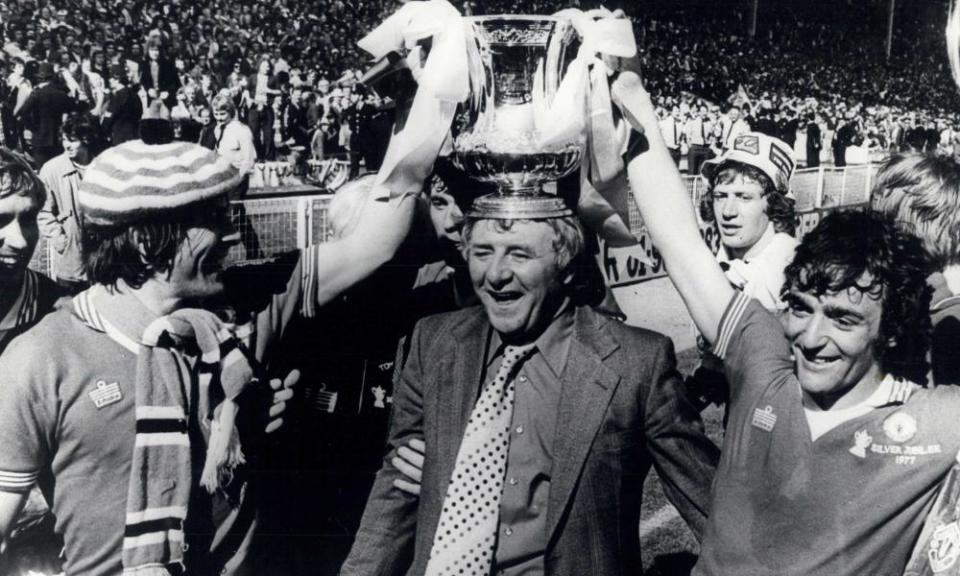 Manchester United celebrate their FA Cup final win over Liverpool, 1977.