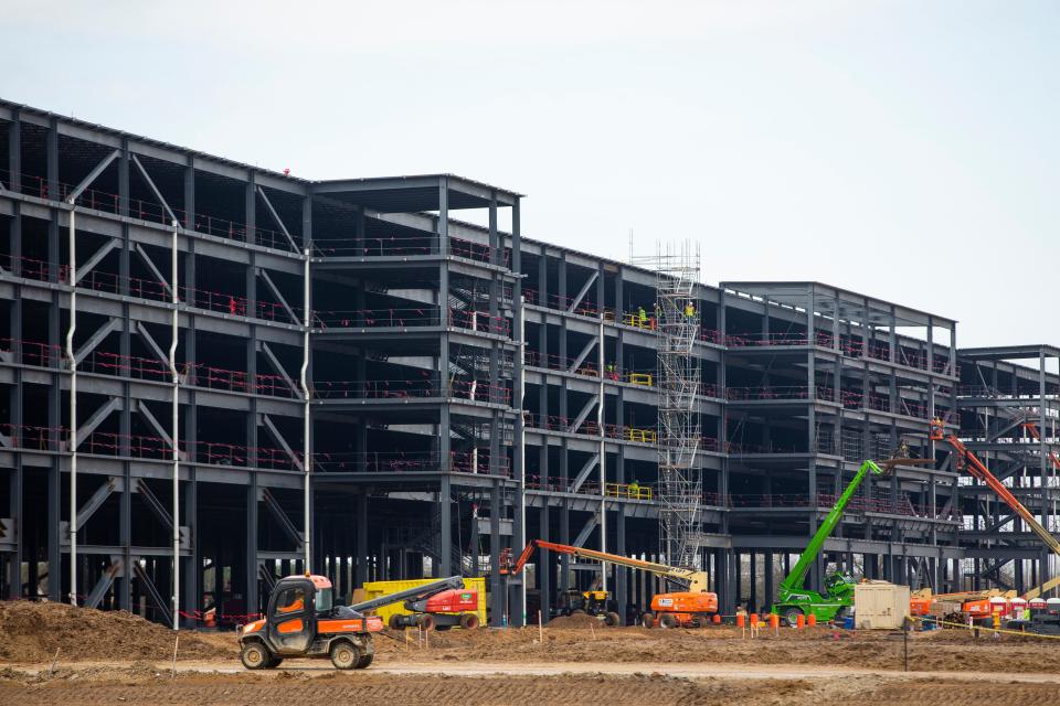 Construction continues on the Amazon facility Monday, April 4, 2022, in Elkhart. The company will need 1,000 people to staff two new facilities next year.