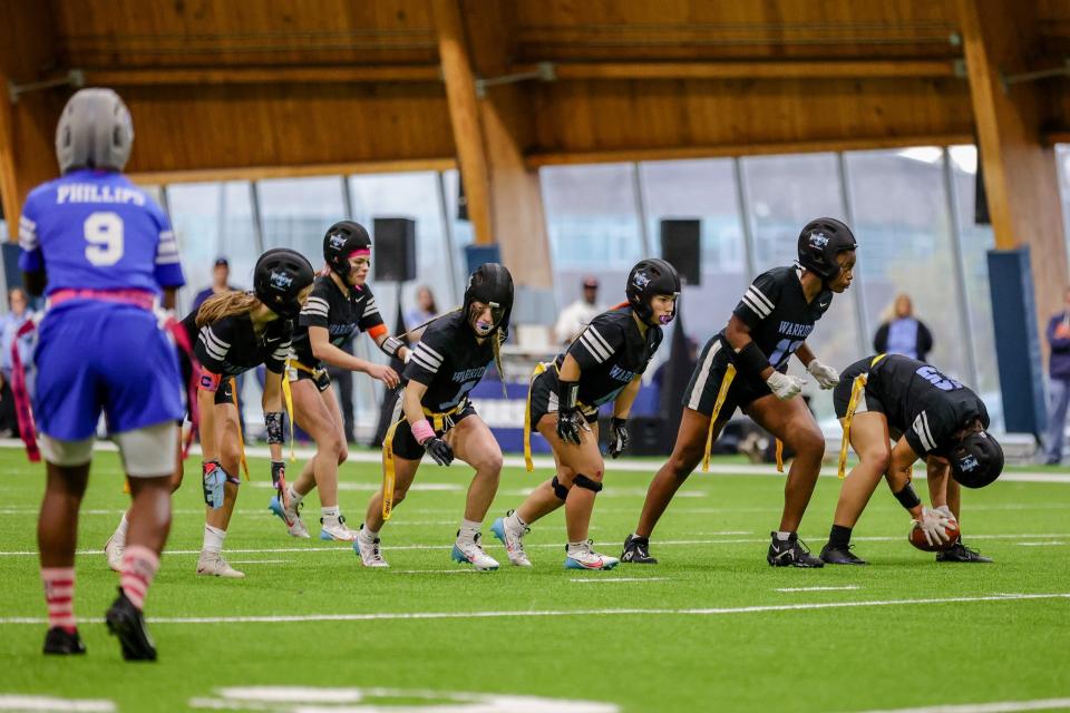 Willowbrook lines up against Chicago Phillips for a play during the High School Girls Flag Football State Championships, hosted by the Chicago Bears at Halas Hall, Sunday, October 29, 2023, in Lake Forest, Illinois.