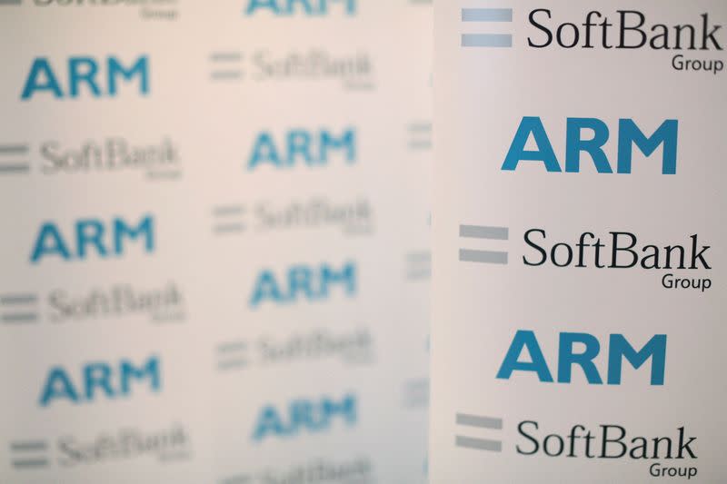 FILE PHOTO: An ARM and SoftBank Group branded board is displayed at a news conference in London