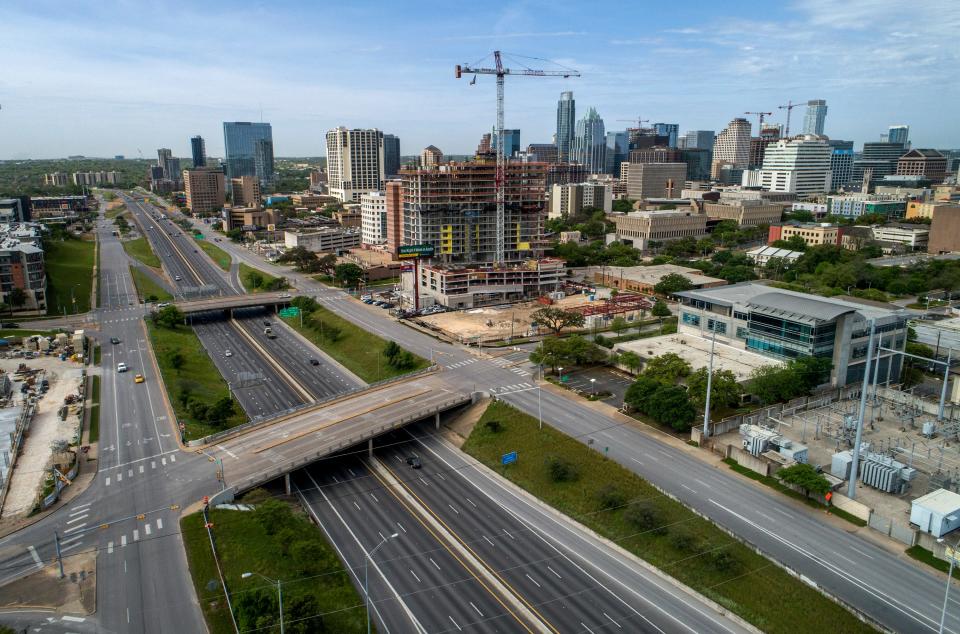 Light traffic flows on I-35 in downtown Austin on Sunday March 29, 2020, during the shelter in place order due to the coronavirus. 