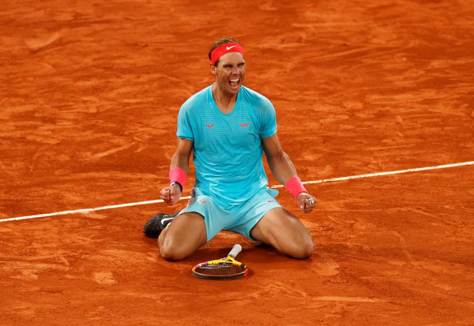 Rafael Nadal celebrates after winning his 13th French Open title.