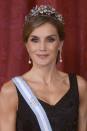 <p>A former journalist and news anchor, Letizia met her future husband on the Galician coast of Spain while she was covering the sinking of an oil ship. In 2004, the pair tied the knot after Felipe, the then-Prince of Asturias, proposed with a 16-baguette diamond ring. Letizia officially became the Queen of Spain 10 years later, after Felipe ascended the throne from his father. She is the first Spanish queen to have commoner roots, though she is also a descendent of medieval nobility.</p>