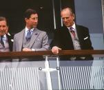 <p>The Prince of Wales enjoys a conversation with his father, the Duke of Edinburgh, at the horse-racing in Epsom. </p>