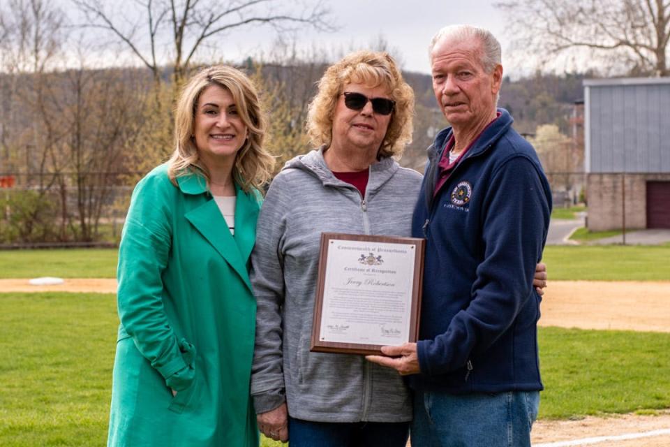 Stroudsburg Little League President Jerry Robertson (right) with his wife, Robin Robertson, (center) and state Rep. Rosemary Brown in Stroudsburg on Saturday, April 23, 2022. Robertson is set to retire after 26 years as the league's president.