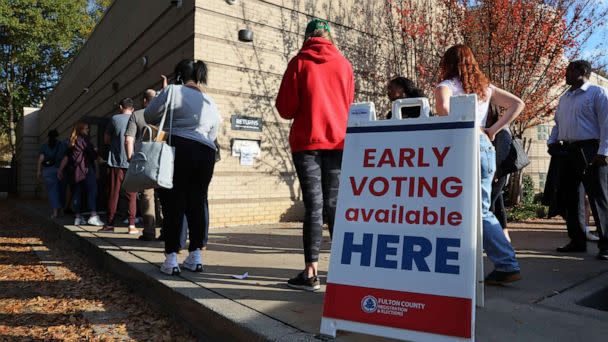 PHOTO: People wait in line for early voting for the midterm elections at Ponce De Leon Library on Nov. 4, 2022 in Atlanta. (Michael M. Santiago/Getty Images)