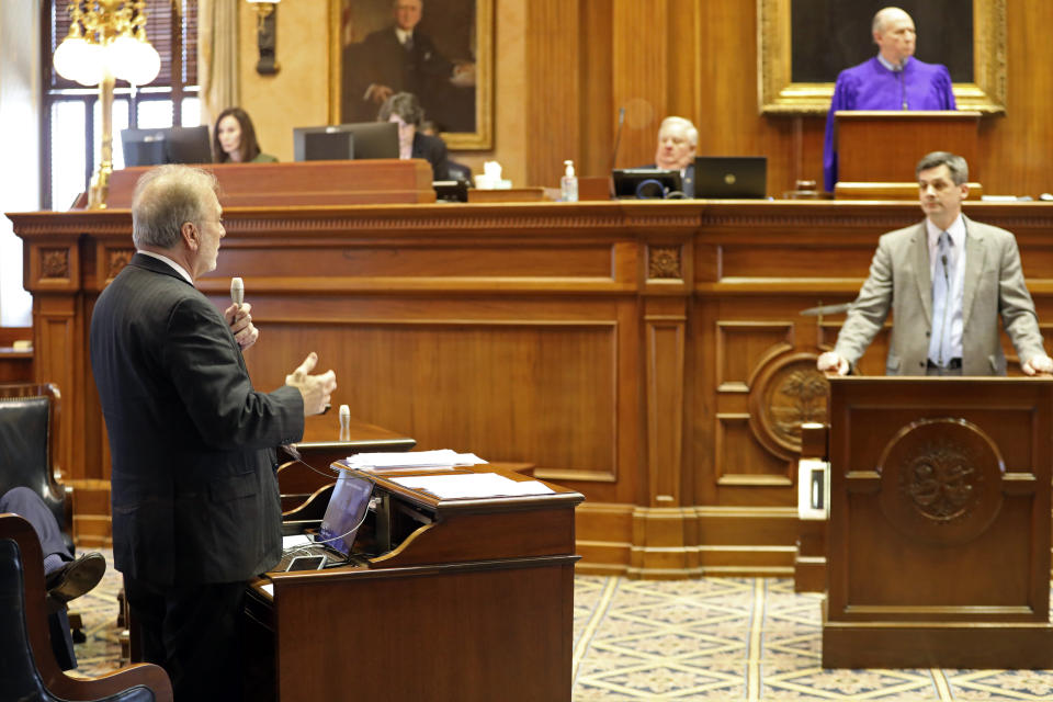 South Carolina state Sen. Brad Hutto, D-Orangeburg, left, asks questions to Senate Majority Leader Shane Massey, R-Edgefield, right, during a debate over gun laws, Thursday, Feb. 1, 2024, in Columbia, S.C. (AP Photo/Jeffrey Collins)