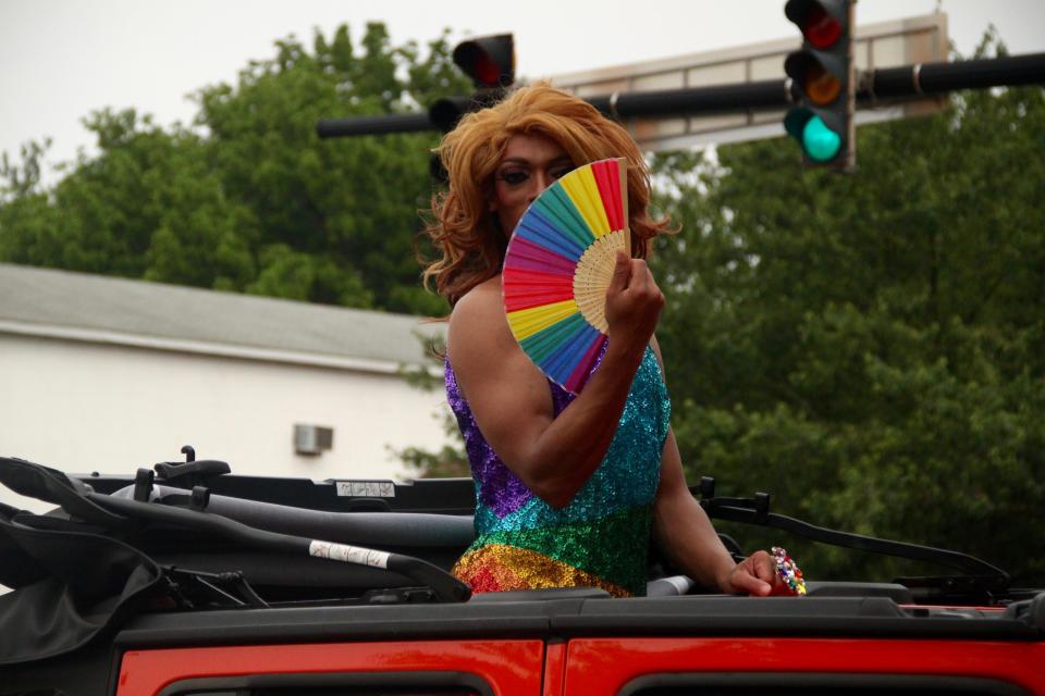 Drag performer Ivy Blue Austin of Rehoboth Beach shows off LGBT pride colors in Delaware's first Pride Parade on June 1, 2019