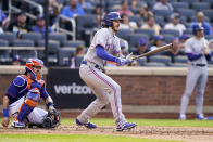 Texas Rangers' Jonah Heim hits a single off New York Mets starting pitcher Trevor Williams (29) in the fourth inning of a baseball game, Saturday, July 2, 2022, in New York. (AP Photo/John Minchillo)