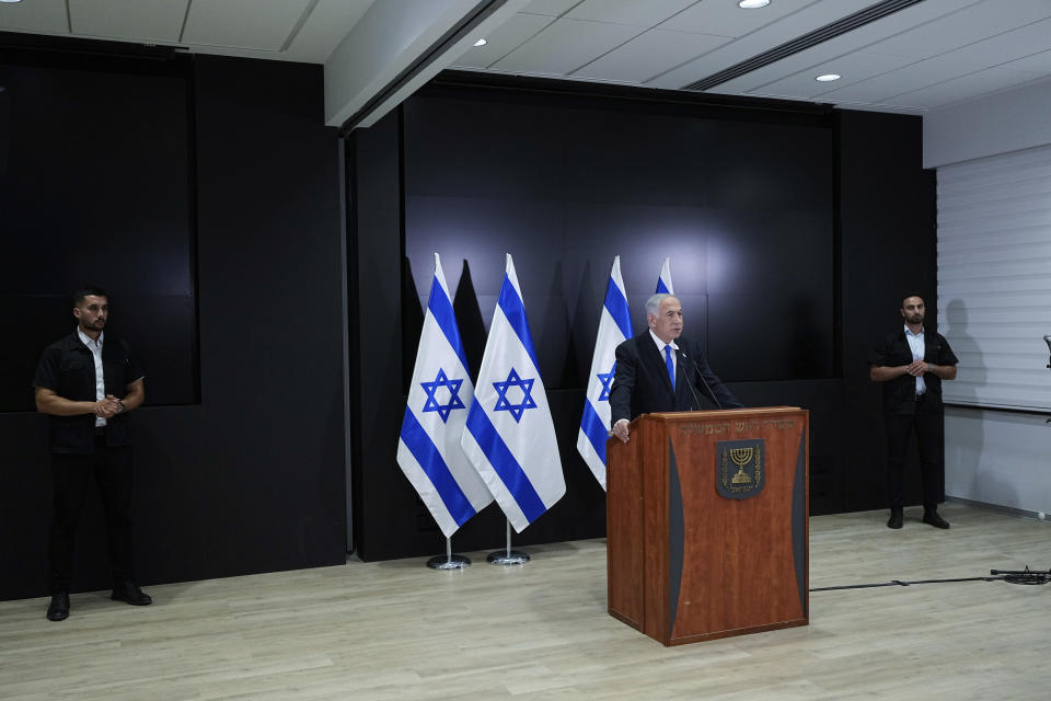 Israeli Prime Minister Benjamin Netanyahu speaks to the media during a press conference, in Tel Aviv, Israel, Monday, April 10, 2023. (AP Photo/Ohad Zwigenberg)