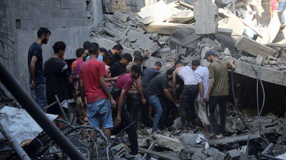 PHOTO: Palestinian citizens inspect damage to their homes caused by Israeli airstrikes on October 12, 2023 in Gaza City, Gaza. (Ahmad Hasaballah/Getty Images)