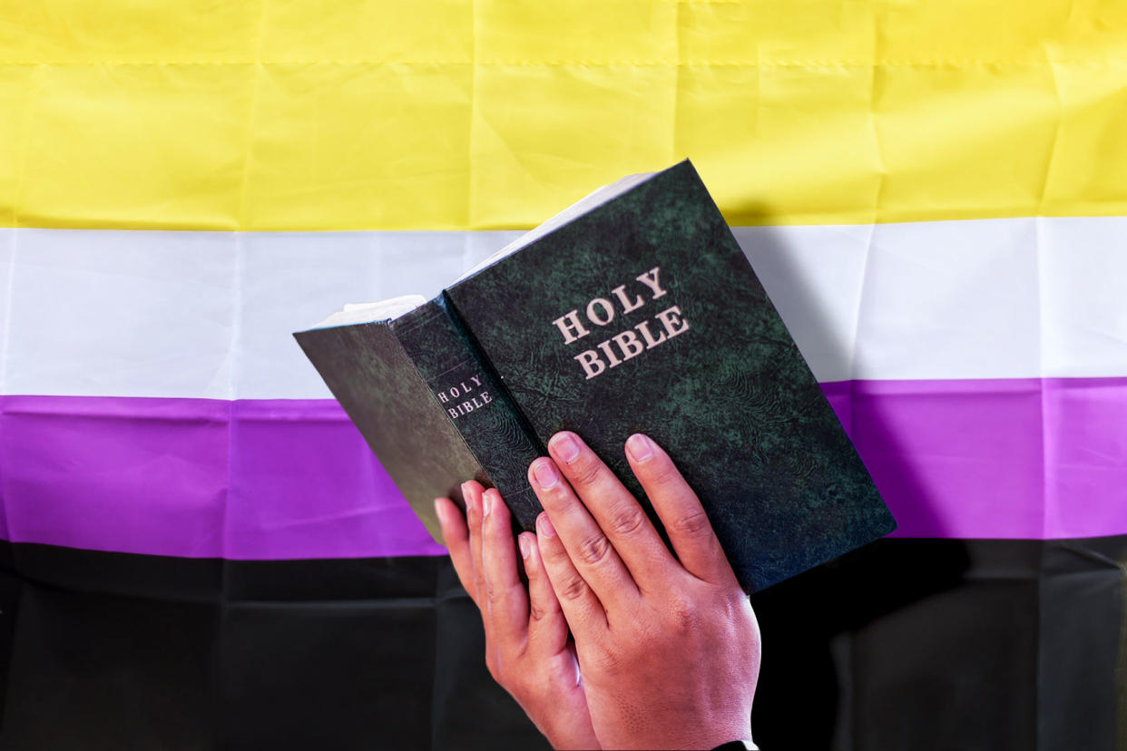 A Bible And A Nonbinary Flag Photo illustration by Salon/Getty Images