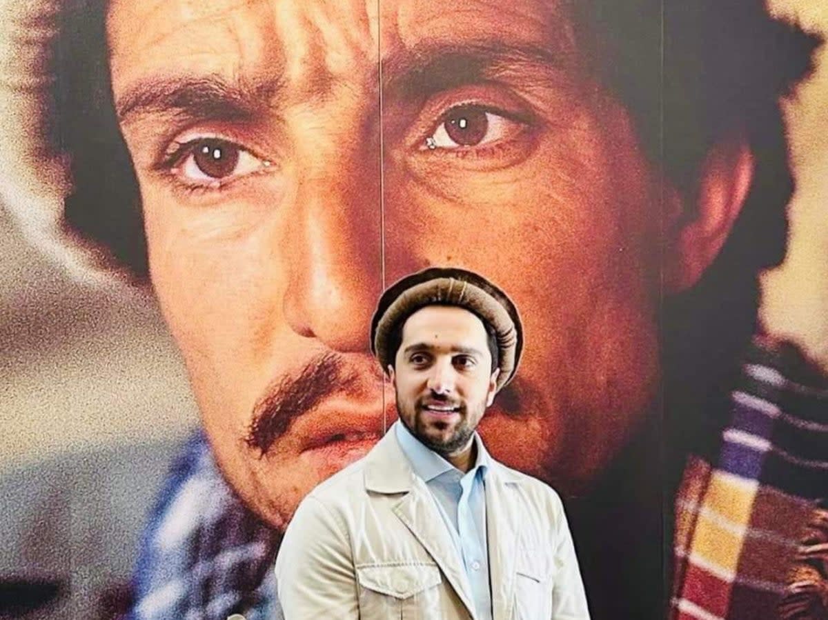 Ahmad Massoud stands in front of a portrait of his father, the revered Afghan guerrilla commander Ahmad Shah Massoud (Special arrangement/The Independent)