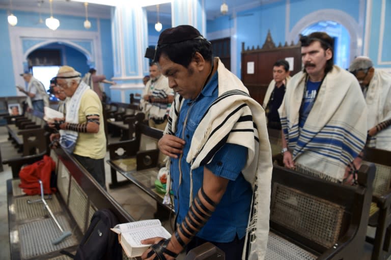 Members of India's tiny Jewish community pray at the Magen David Synagogue in Mumbai