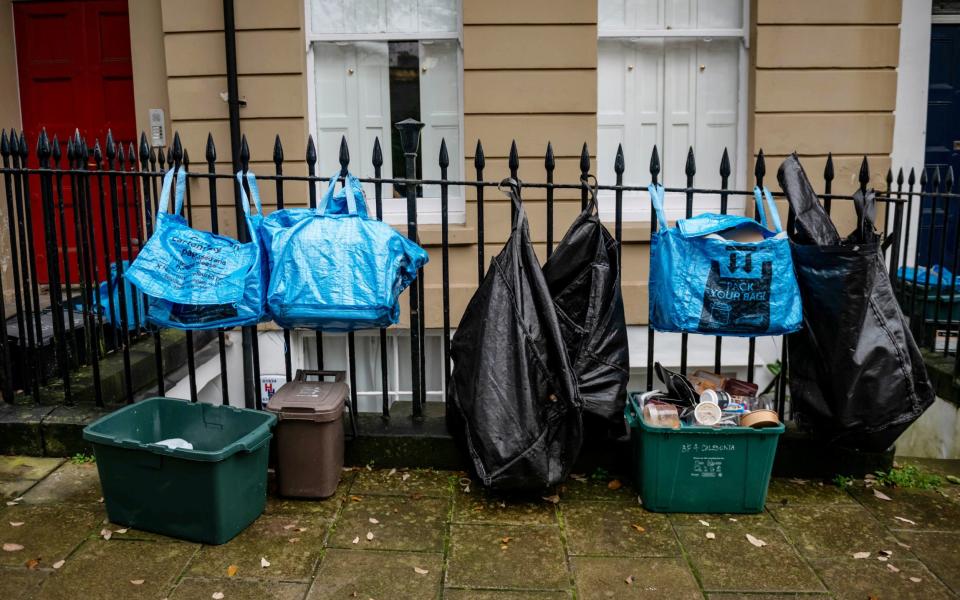 The weekly scene on the street lined with large balconies and sash windows is in stark contrast to its normal picturesque nature