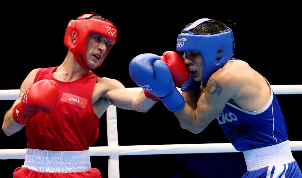 LONDON, ENGLAND - AUGUST 05: John Joe Nevin of Ireland (L) in action with Oscar Valdez Fierro of Mexico during the Men's Bantam (56kg) Boxing on Day 9 of the London 2012 Olympic Games at ExCeL on August 5, 2012 in London, England. (Photo by Scott Heavey/Getty Images)