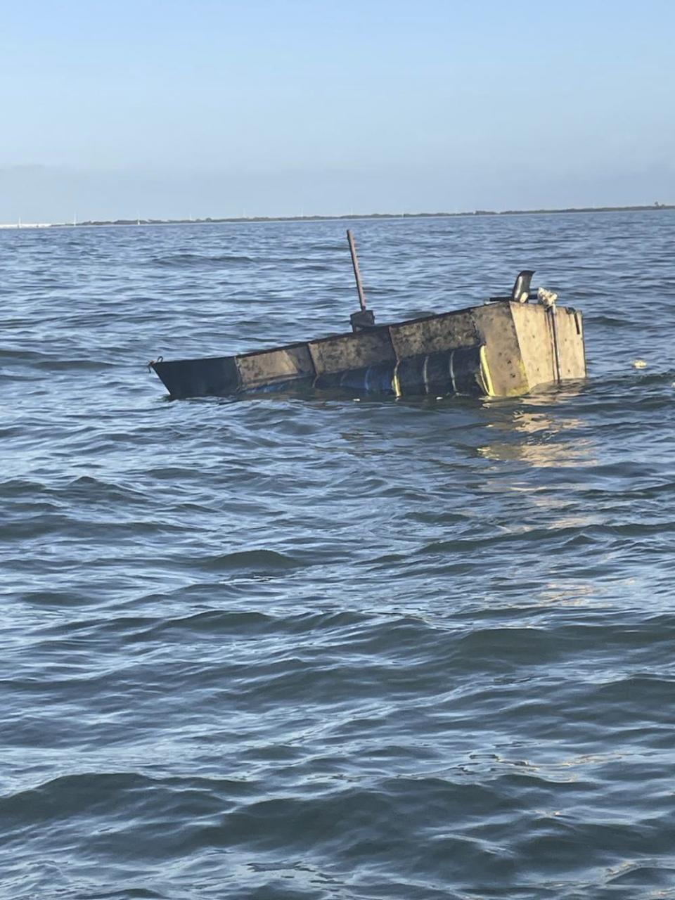 This photo provided by the U.S. Coast Guard Southeast region shows an interdicted migrant voyage about 16 miles south of Duck Key, Fla., Friday, Dec. 30, 2022. The people were repatriated to Cuba on Wednesday, Jan. 4, 2023. (U.S. Coast Guard Southeast via AP)