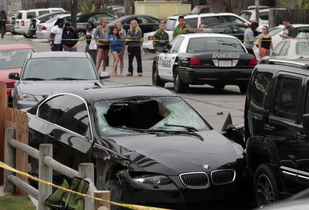 The vehicle of the alleged shooter is pictured at one of the crime scenes after a series of drive-by shootings in the Isla Vista section of Santa Barbara May 24, 2014. REUTERS/Jonathan Alcorn