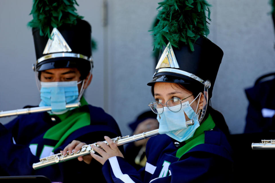 Feb. 16, 2022: Band members play through their masks at Maywood Center For Enriched Studies (MaCES) Magnet school in Maywood, CA. Superintendent Carvalho conducted a two-day school tour, visiting special programs and classrooms at sites across the District. (Gary Coronado / Getty Images)